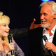 Illustration for article titled Dolly Parton is all of us in this tearful video remembering Kenny Rogers: My heart is broken